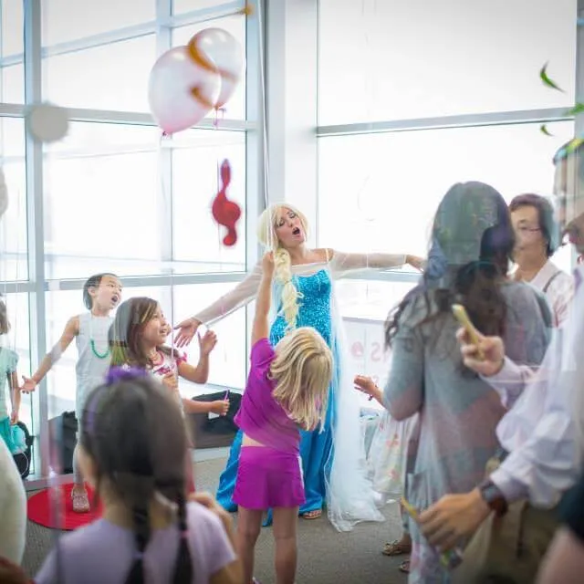 Children singing together in an Opus 1 Music Studio group class